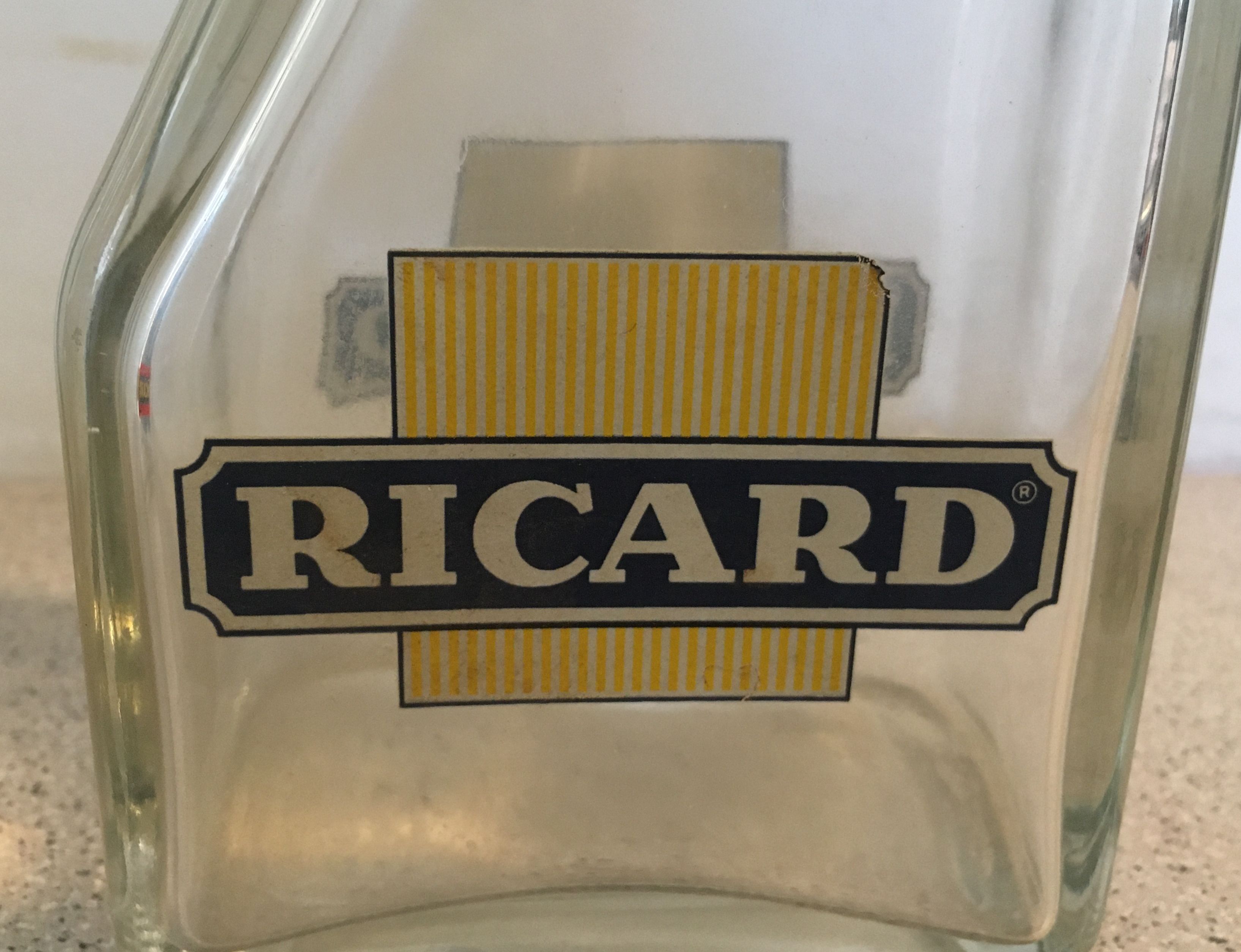 Ricard glass decanter white logo blue cartridge yellow background