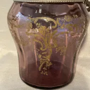Purple glass biscuit barrel with painted gold arabesque decorations for cakes.