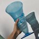 Conical vase in turquoise blue bubbled glass