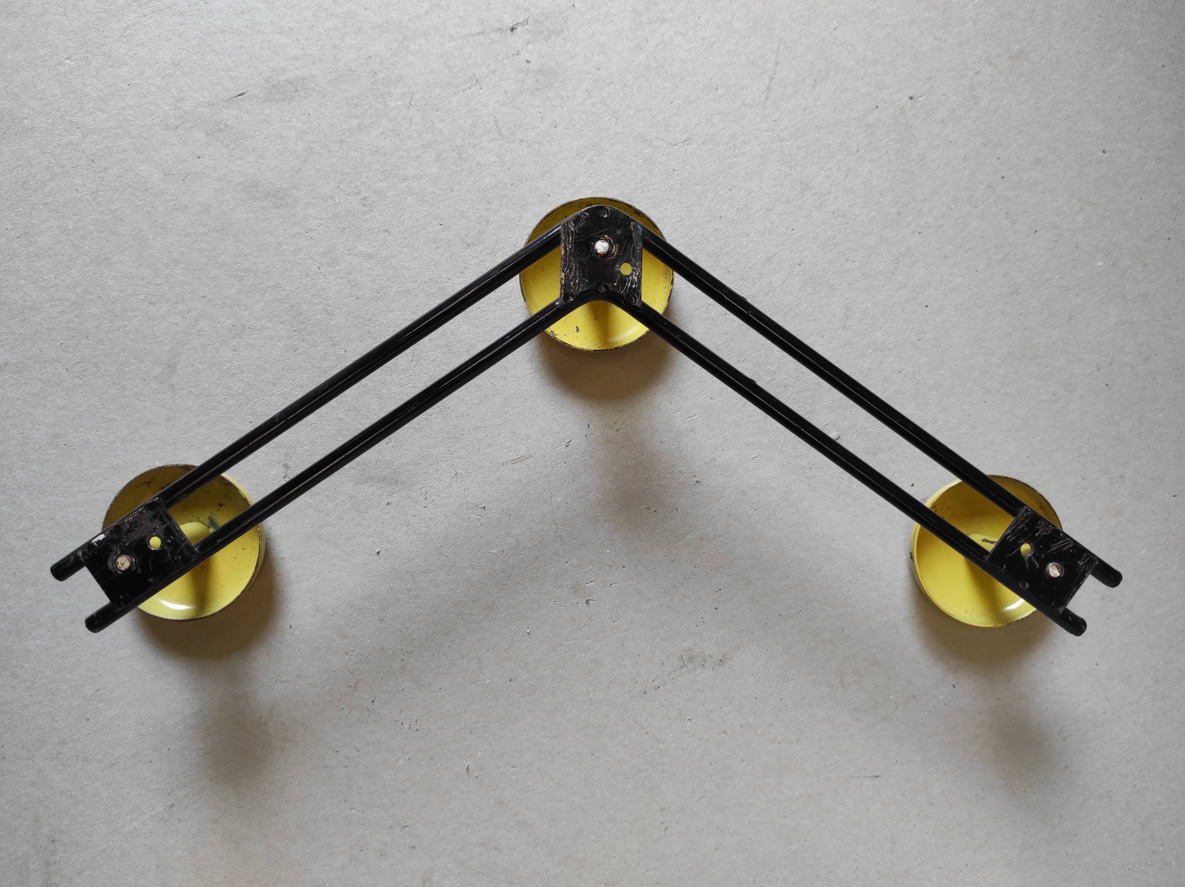 Vintage wall mount in black and yellow metal