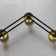 Vintage wall mount in black and yellow metal