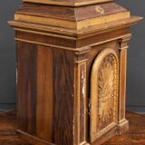 18th century tabernacle decorated with 2 columns and a sun on the facade