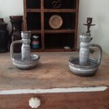 Pair of speckled sandstone candle holders