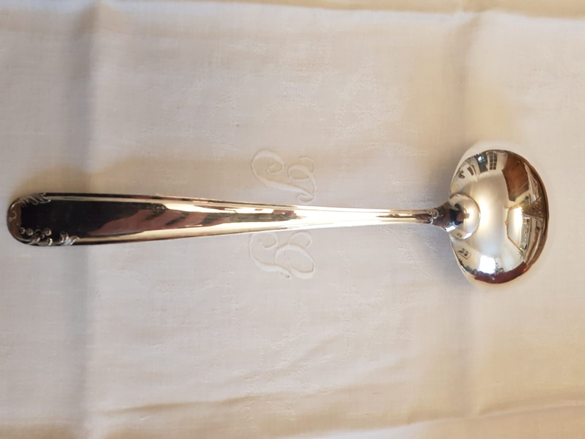 Silver cutlery set for 36 place settings and its ladle.