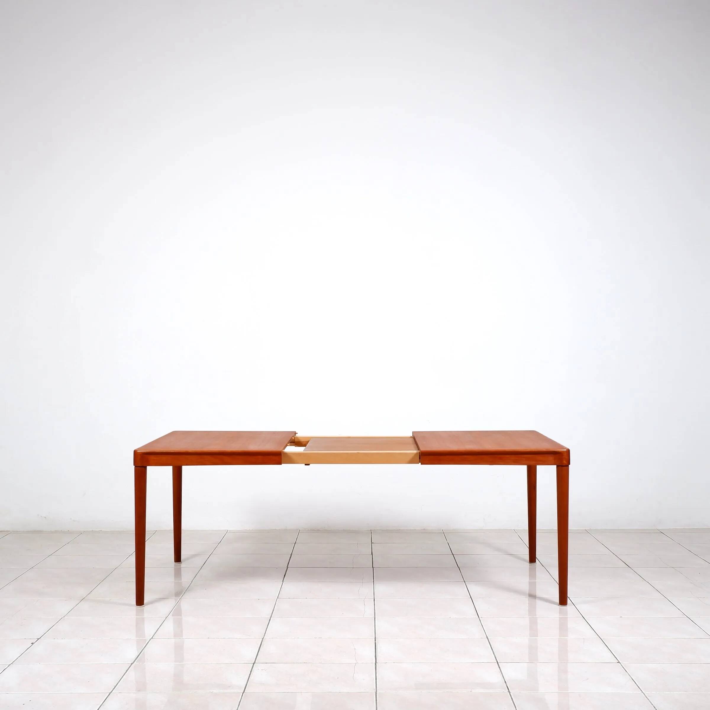 Extendable dining table in teak by H. W. Klein for Bramin Mobler