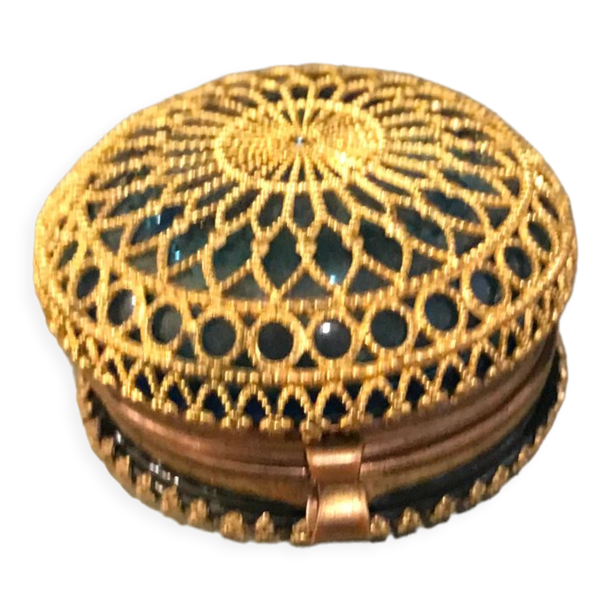 Old pill box made of golden thread