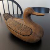 Canard en bois avec compartiment