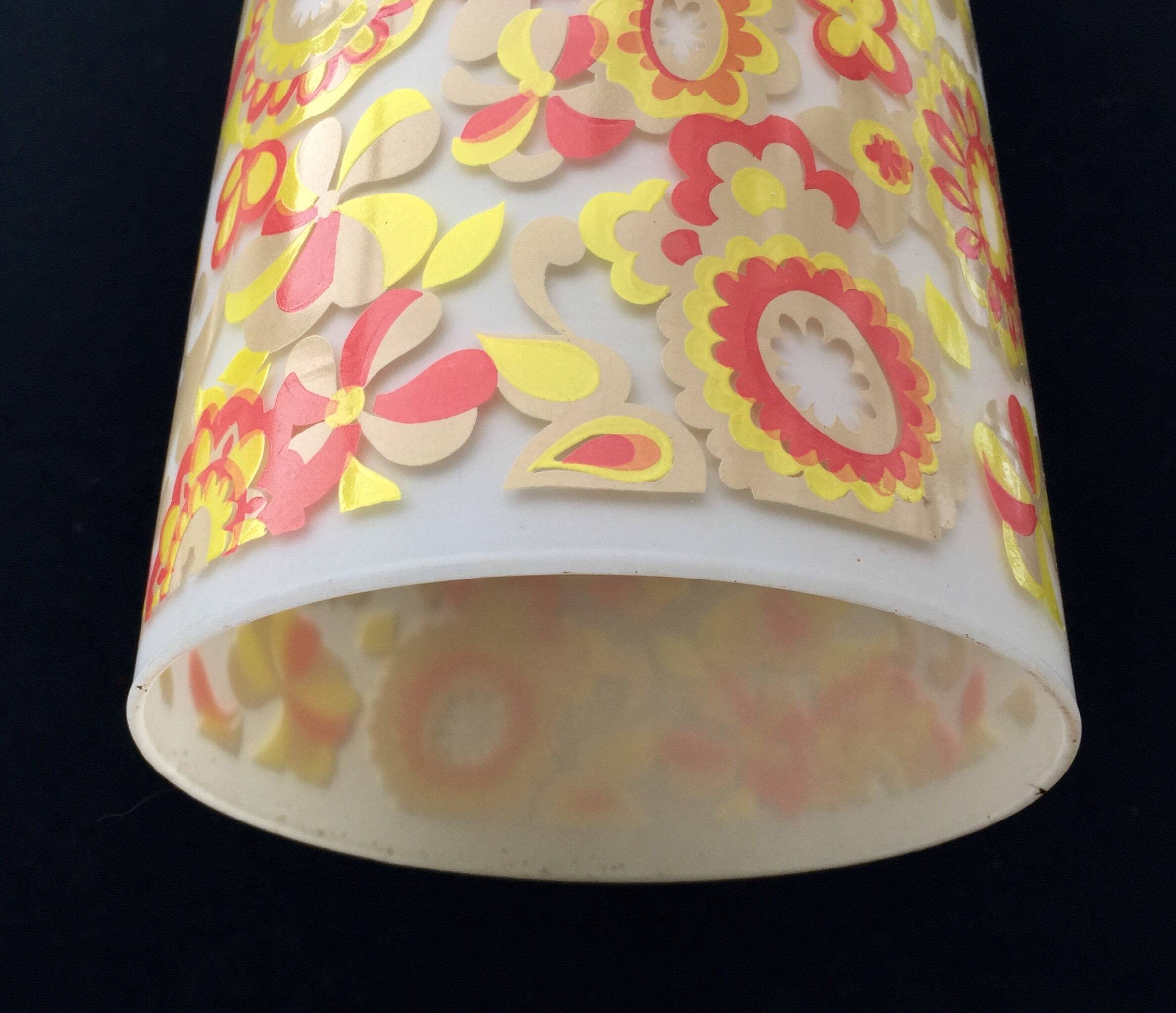 White and orange tube chandelier with seventies pop flowers