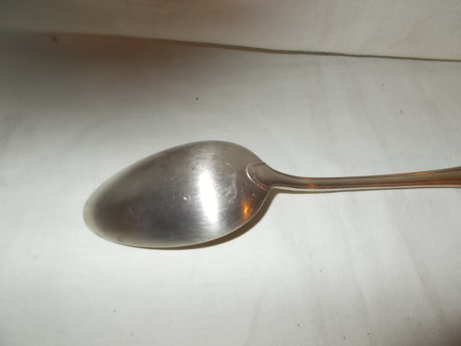Silver metal serving spoon