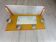 1950s coat rack with mirror, metal hooks, and glass shelf.
