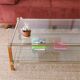 Vintage coffee table with double top from the 1970s.