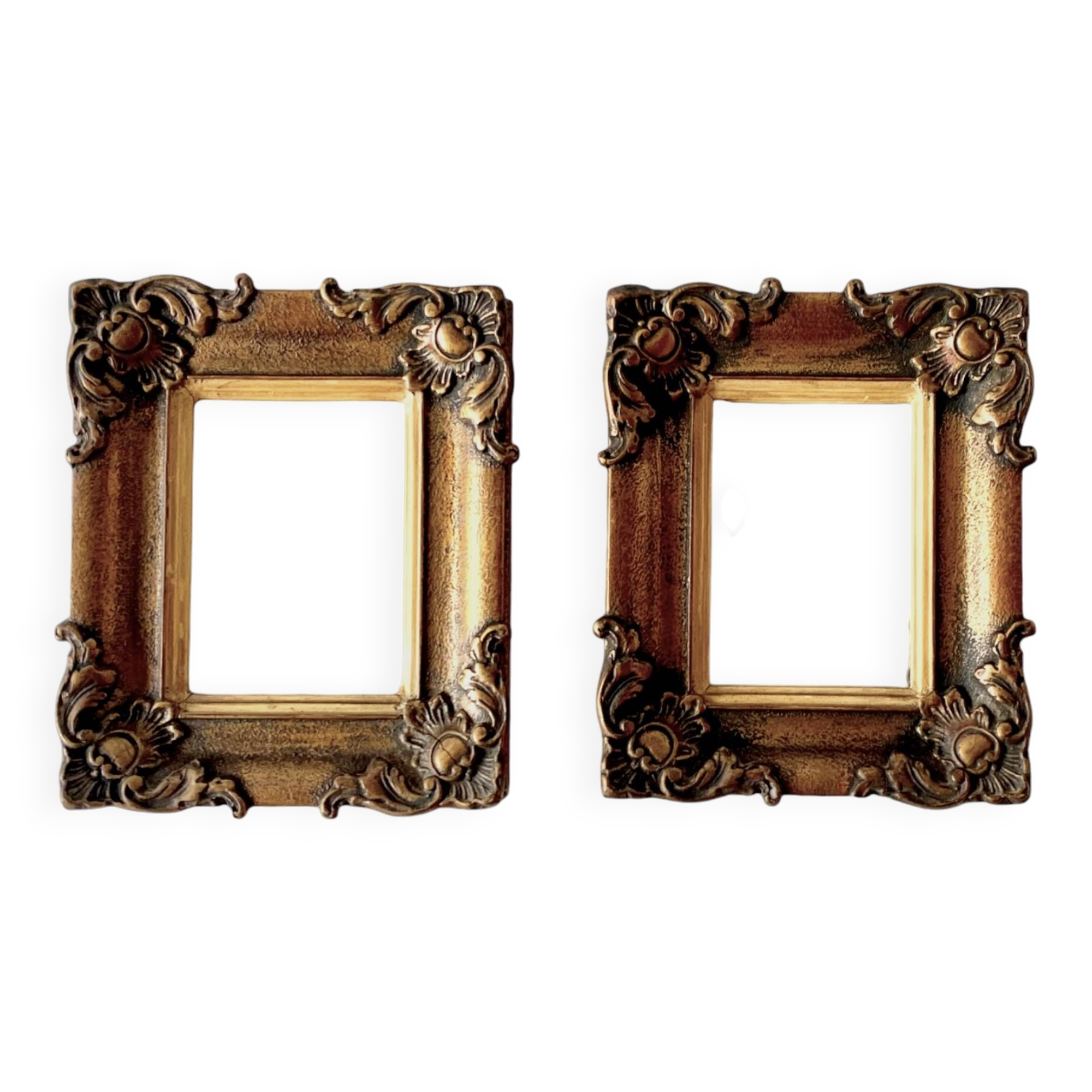 Pair of old carved wooden and plaster frames