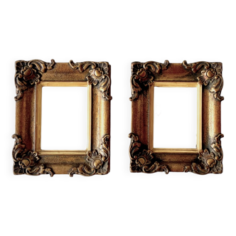 Pair of old carved wooden and plaster frames