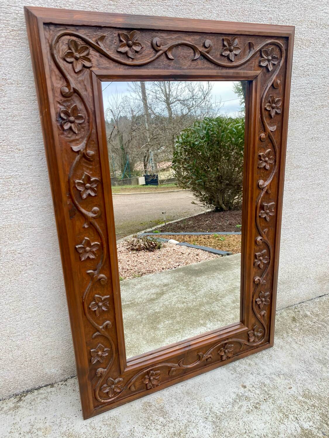 Two antique 19th century mirrors in carved Napoleon oak wood