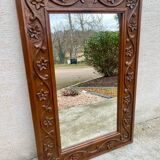 Two antique 19th century mirrors in carved Napoleon oak wood