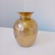 Hammered golden vase