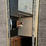 Asymmetrical free-form mirror from the 1970s