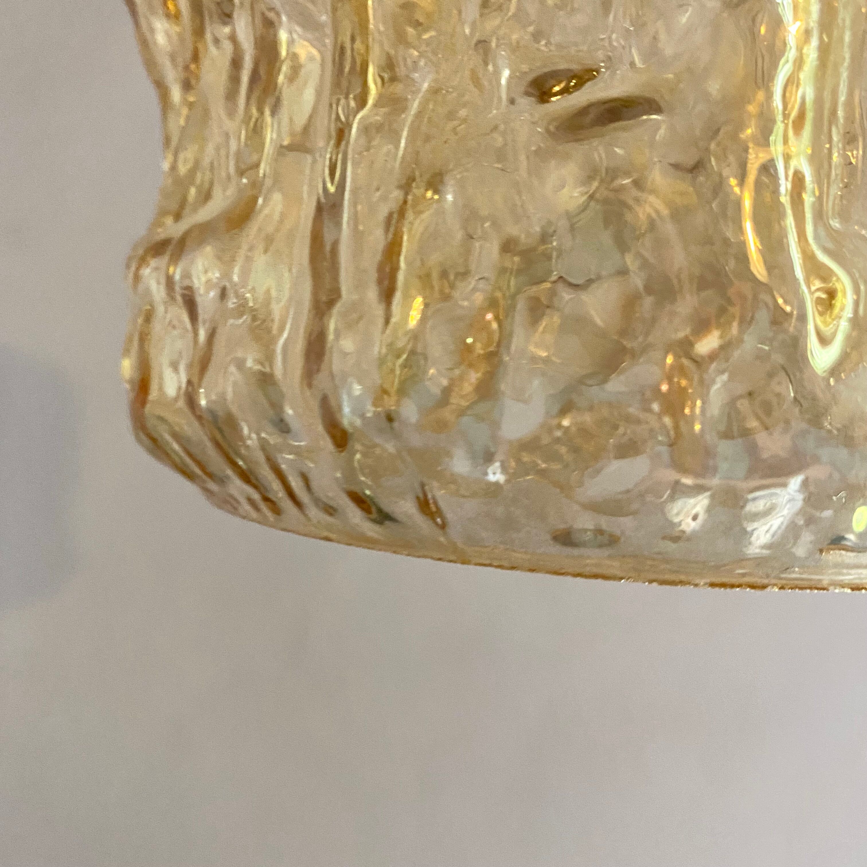 Pair of vintage amber glass pendant lamps