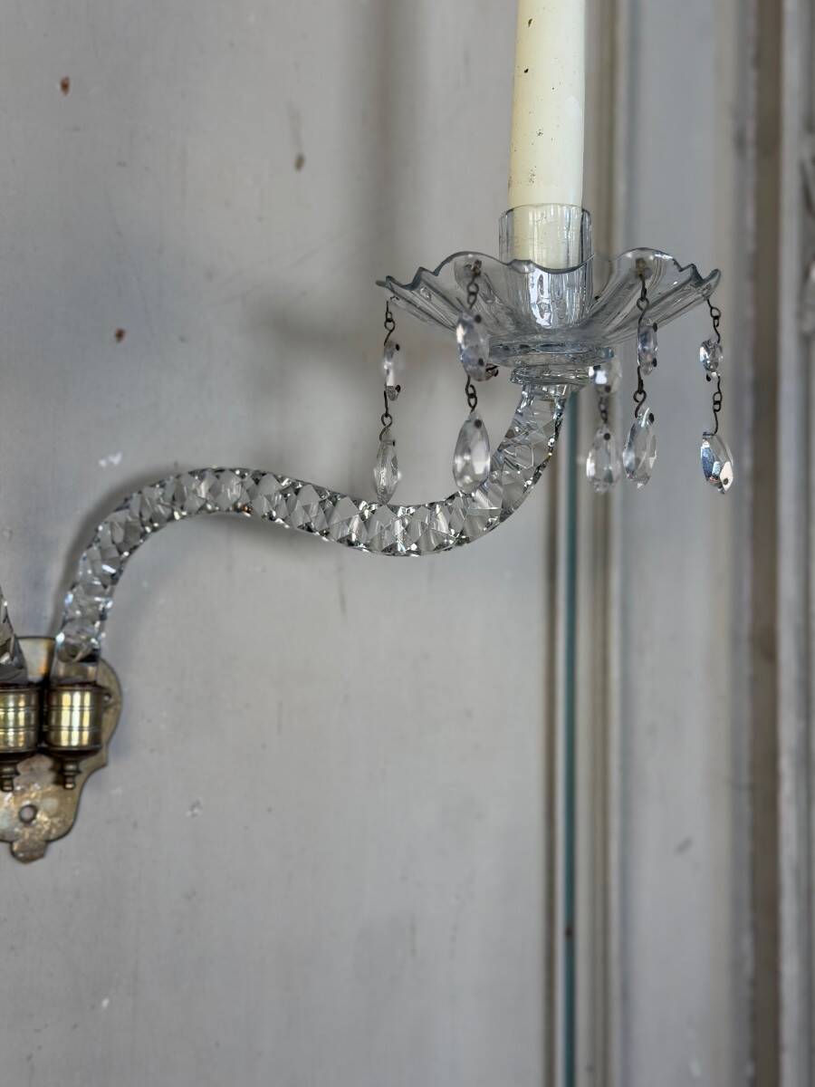 Pair of cut crystal wall sconces in the style of Maydwell and Windle, England, 18th century.