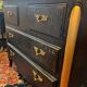 Black painted chest of drawers with golden Japanese bamboo effect