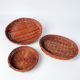 Set of 3 vintage ceramic dishes with wicker baskets.