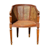 Fauteuil en bois fruitier et cannage style Louis XVl