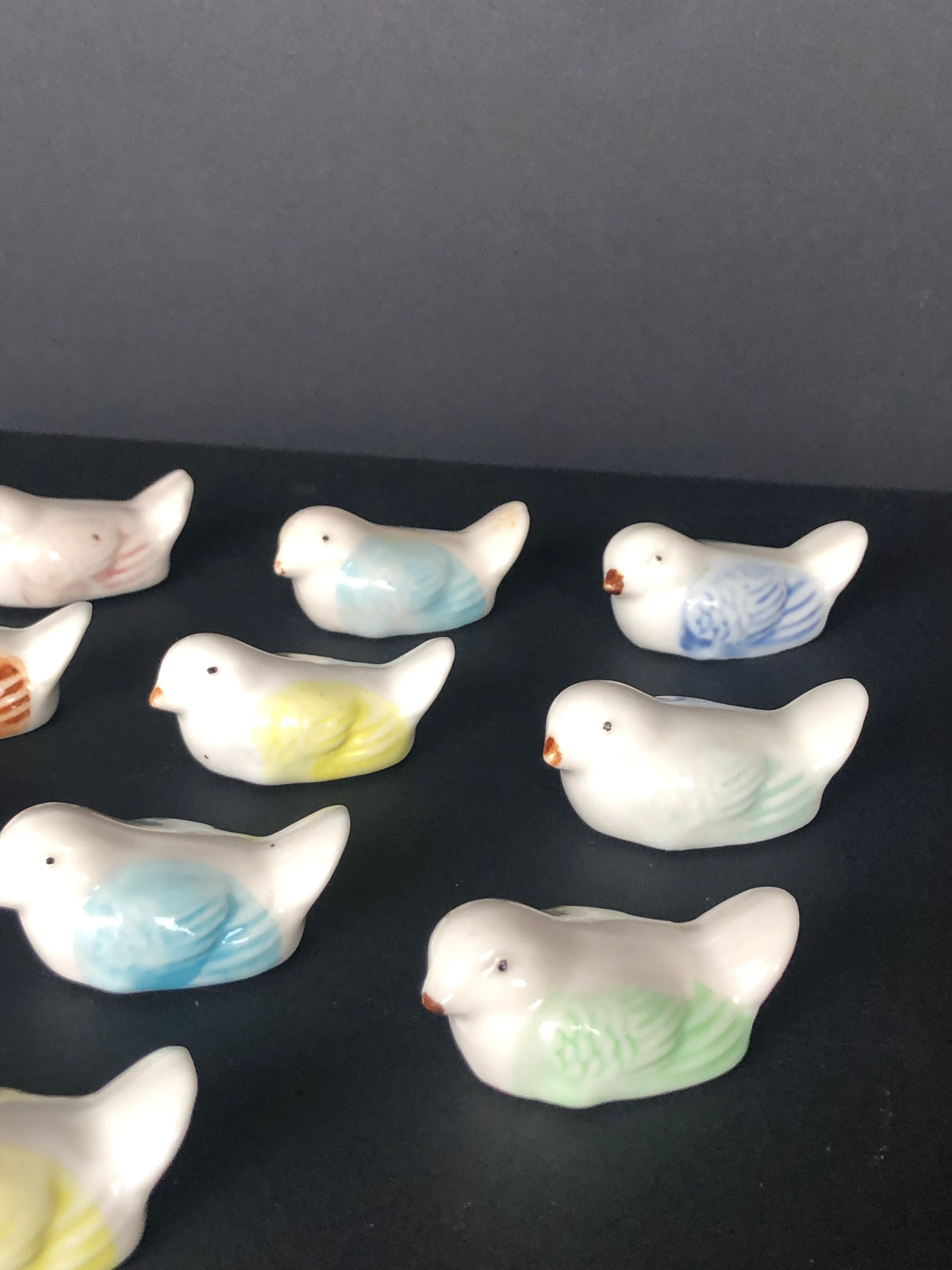 14 vintage porcelain bird knife holders