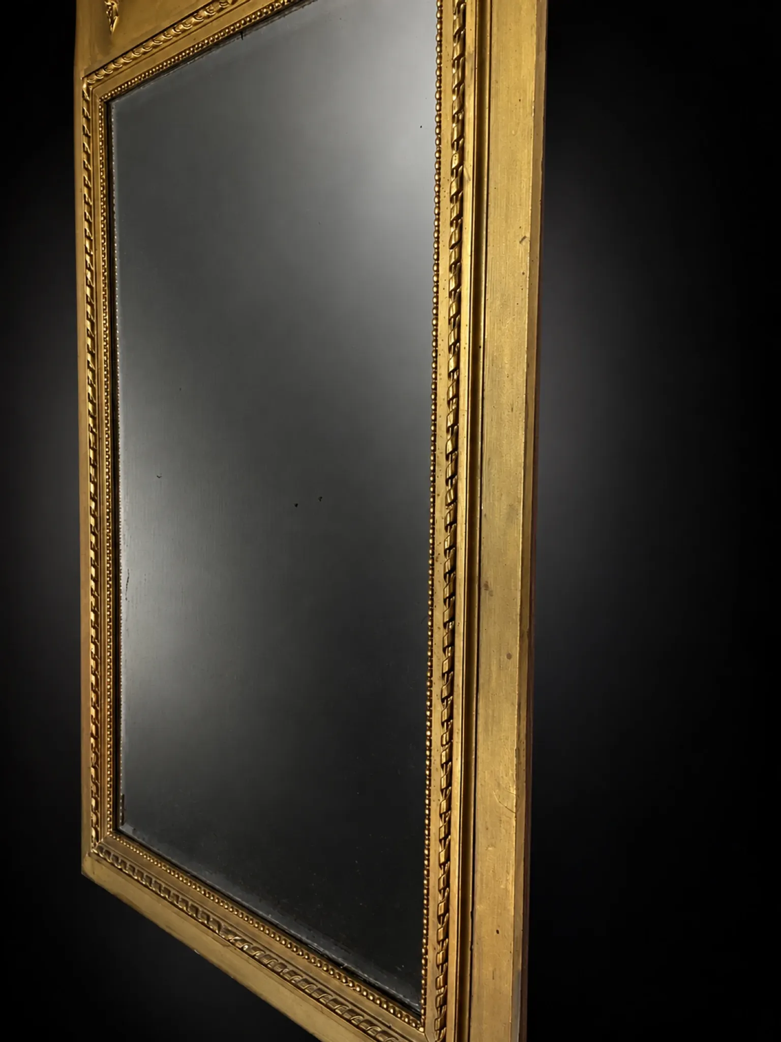 Golden trumeau mirror in Louis XVI style