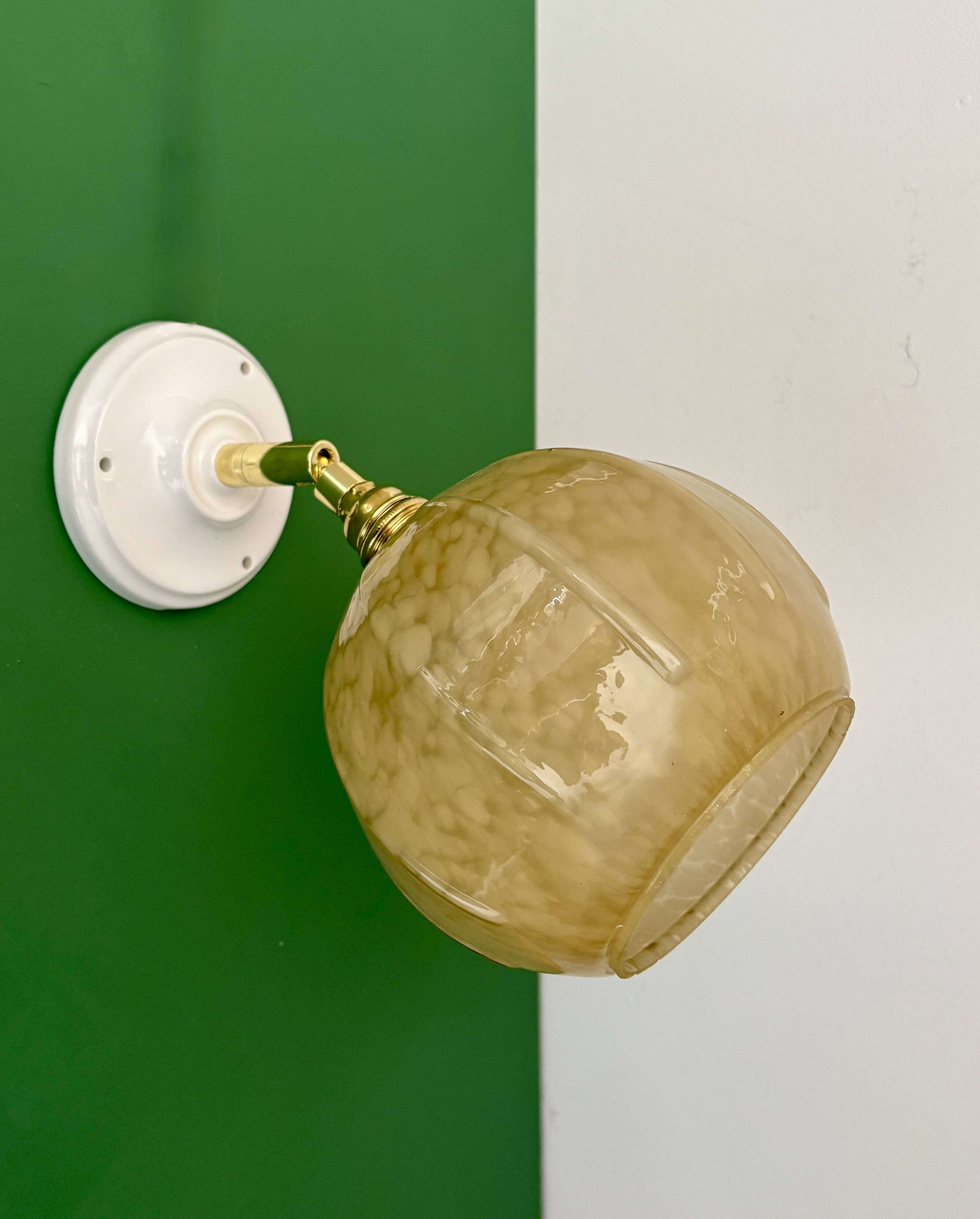 Vintage yellow glass globe wall light