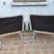 Pair of vintage leather and aluminum armchairs, restored
