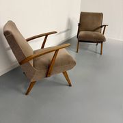 Set of 2 vintage wooden and fabric armchairs designed in the 1960s.