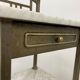 Brass bedside table with a marble top.