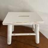 Small footrest bench in patinated white wood