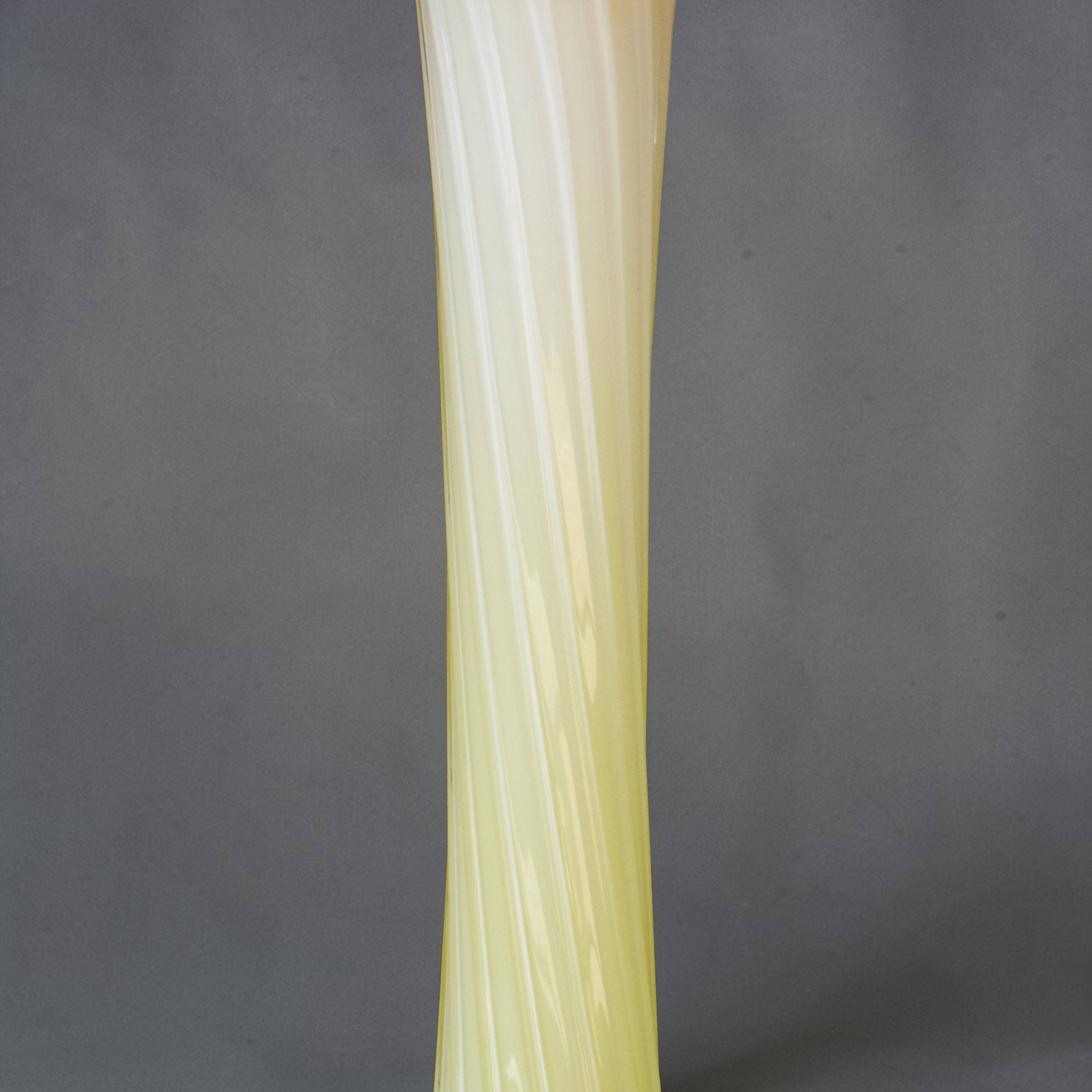 Blown glass vase from Murano in the shape of a yellow flower.