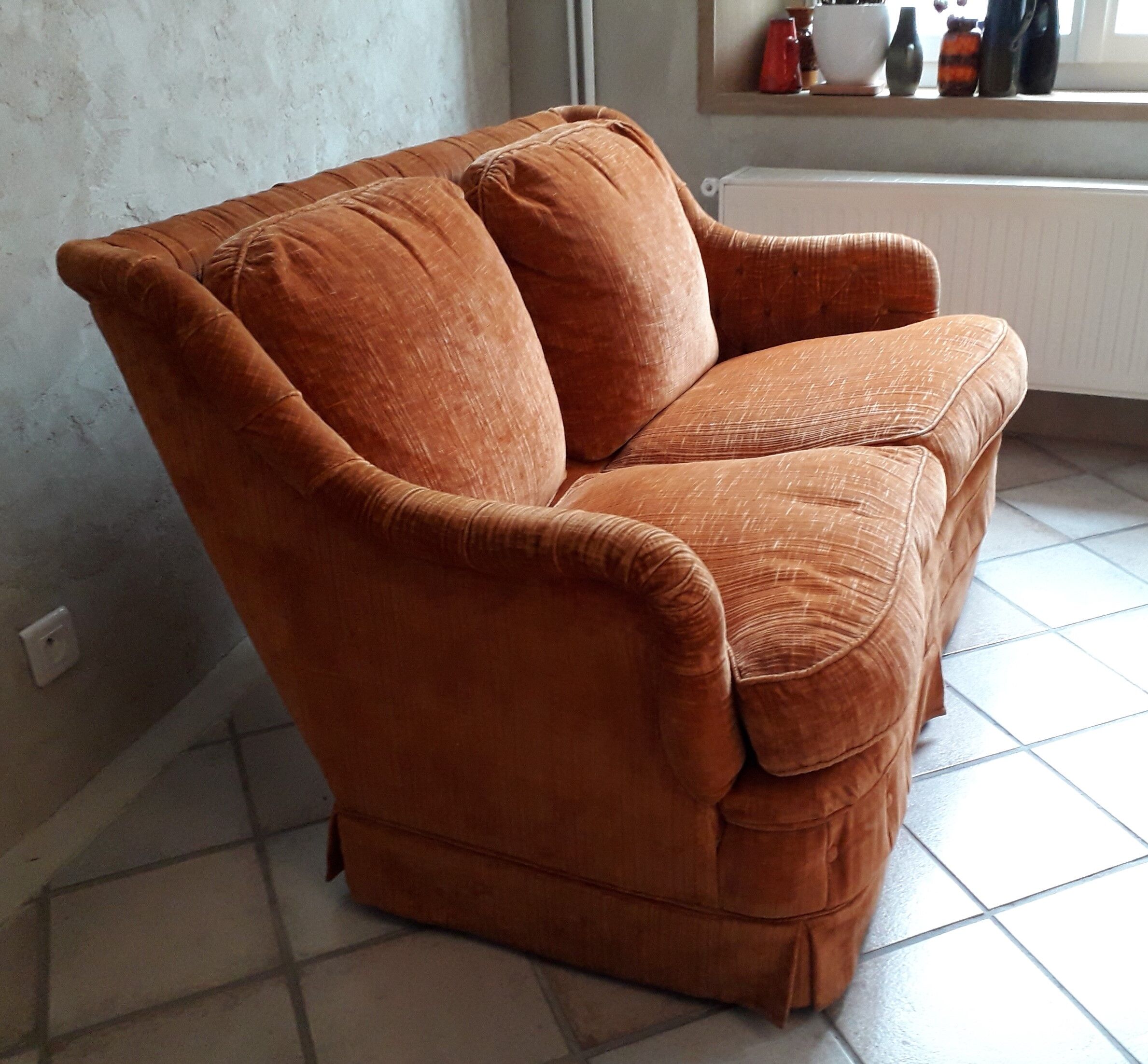 Orange velvet two-seat sofa