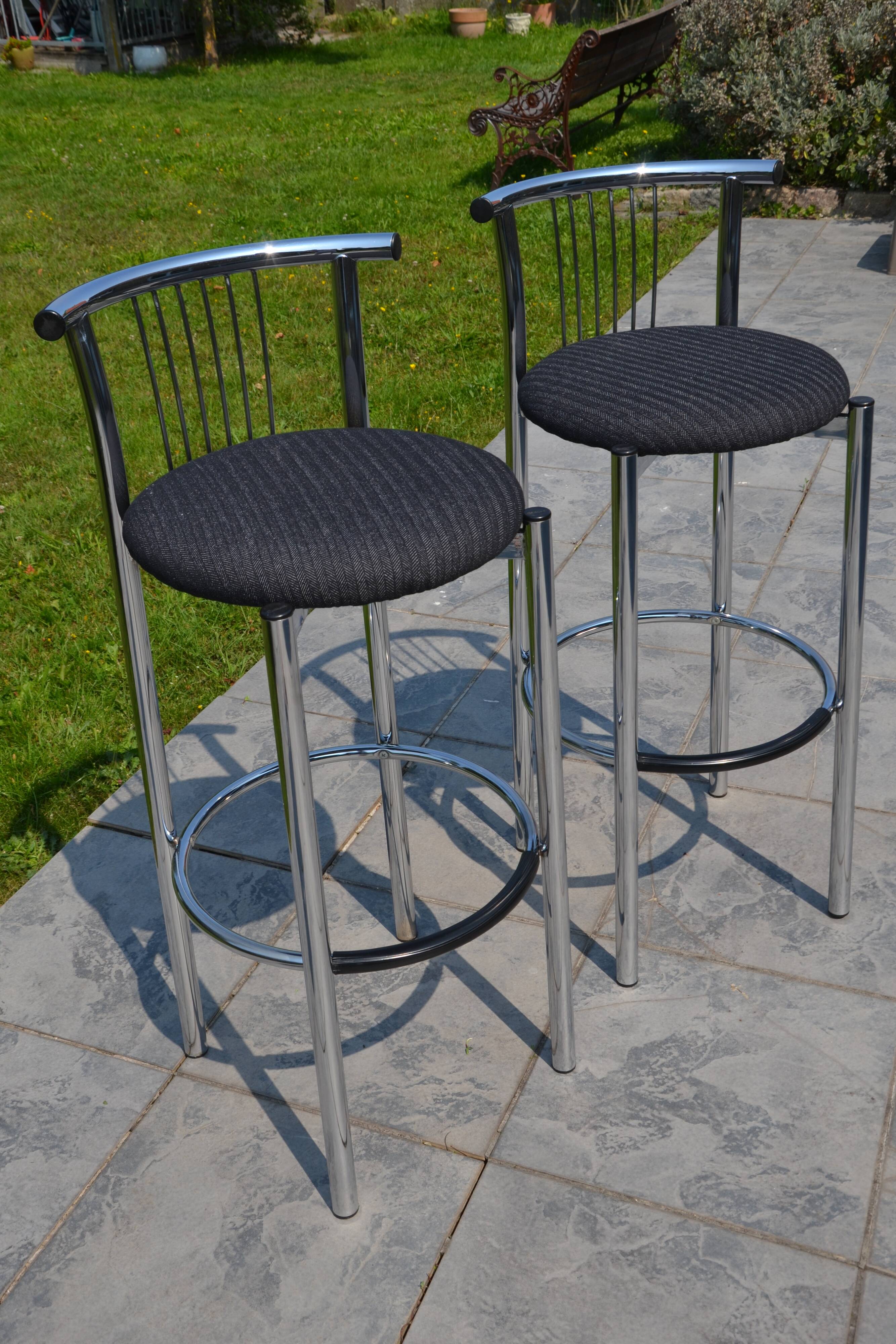 2 "Calligaris" bar stools with chrome metal and refurbished seats.