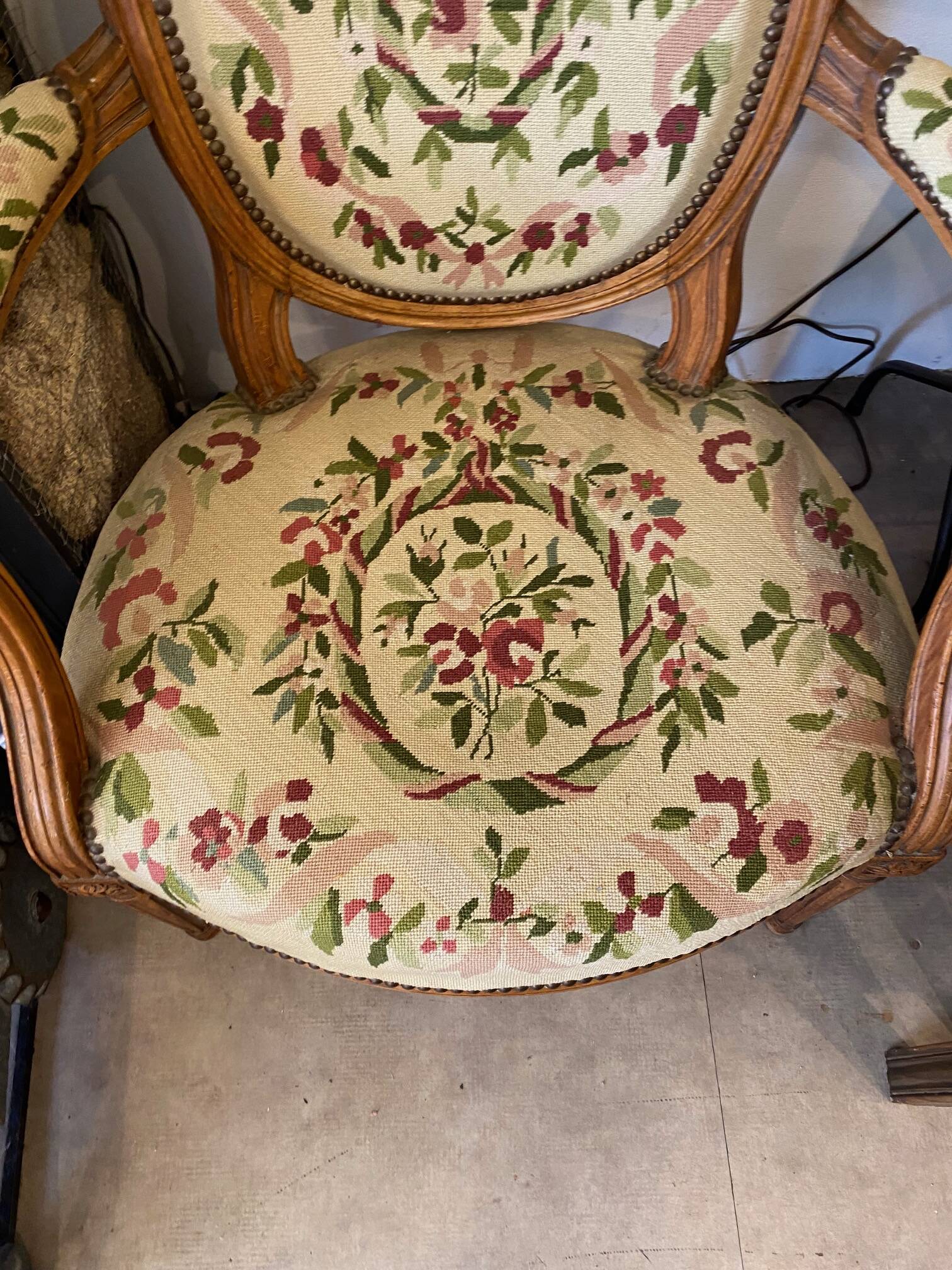 Louis XVI style medallion armchair with floral needlepoint tapestry