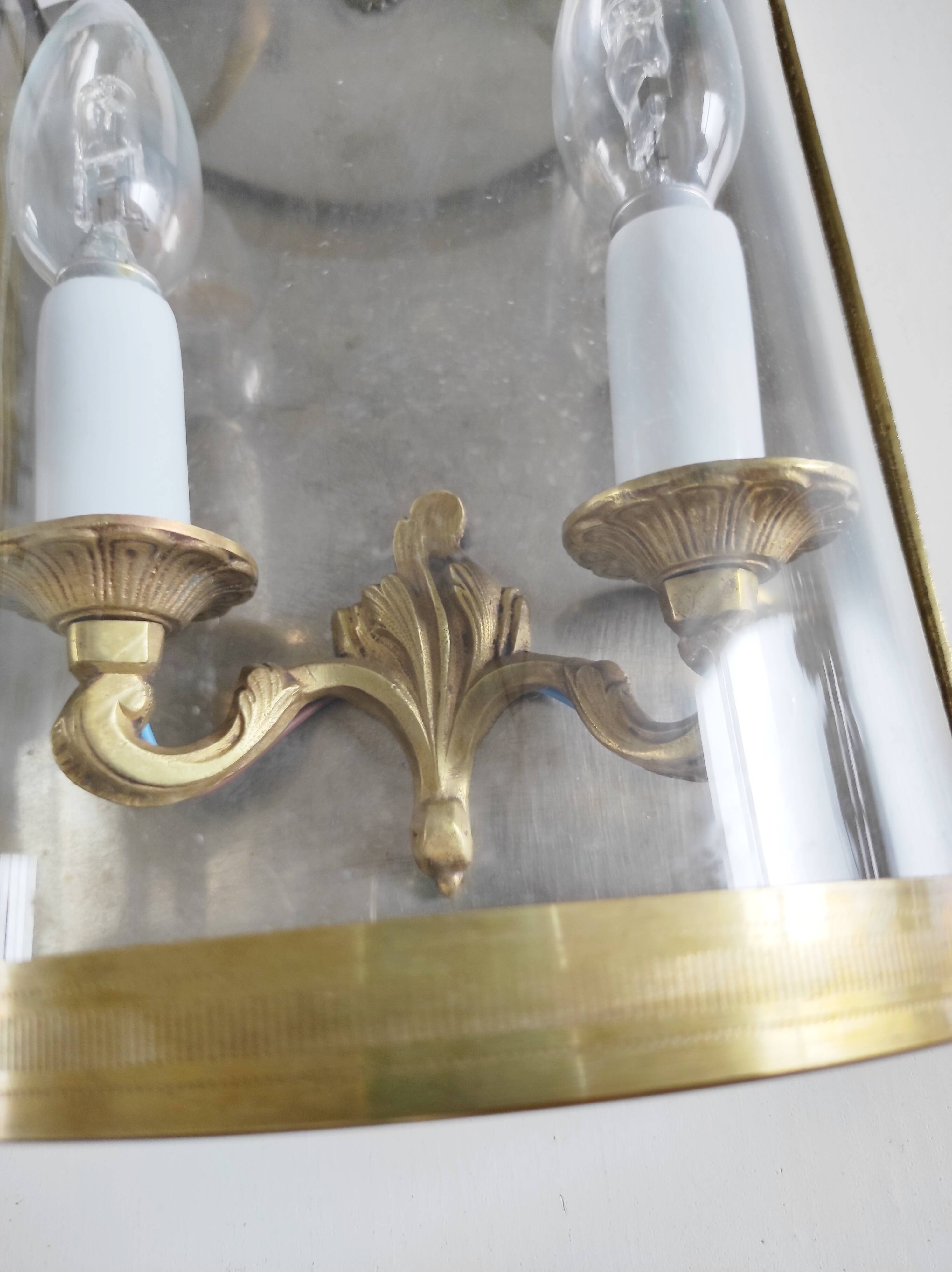 Pair of two-light wall sconces