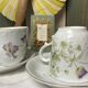 Duo of antique coffee cups