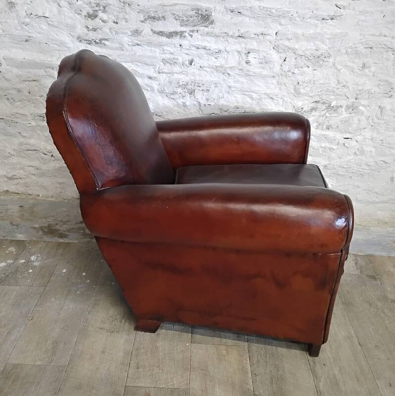 Club chair with floral backrest