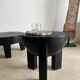 Black mango wood tripod side table with a semi-spherical top, height: 45 cm, diameter: 44 cm.