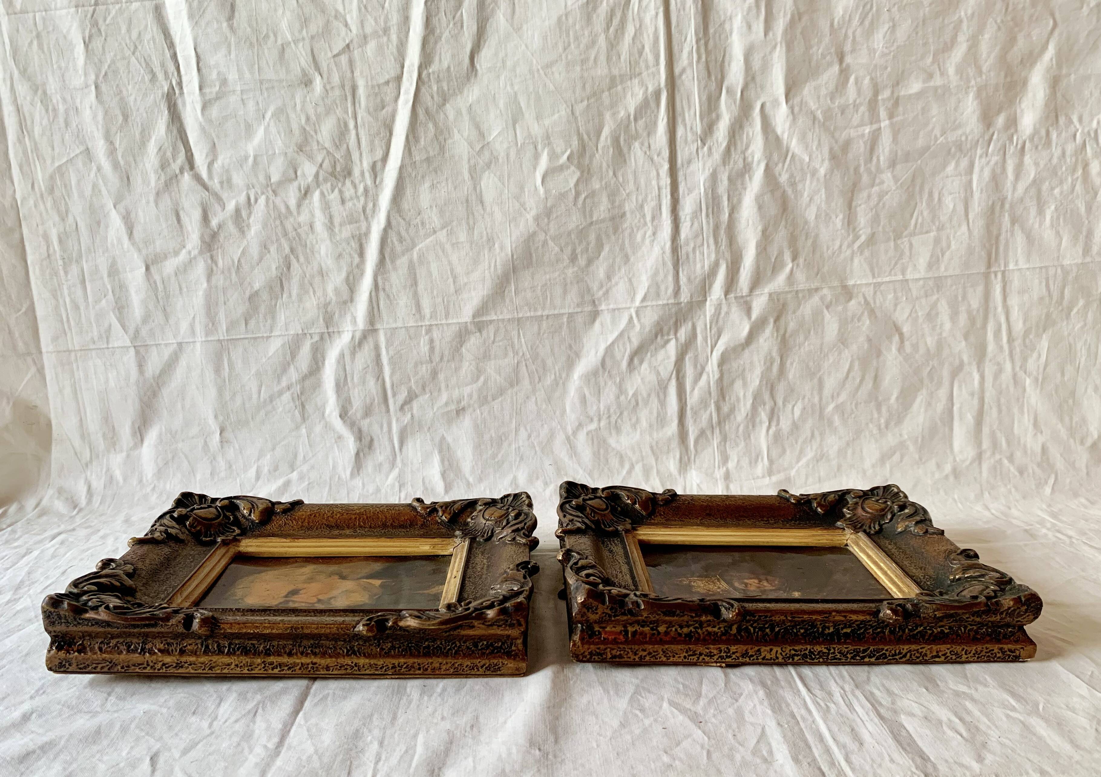 Pair of old carved wooden and plaster frames