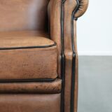 Sheepskin wingback armchair with beautiful colours in good condition