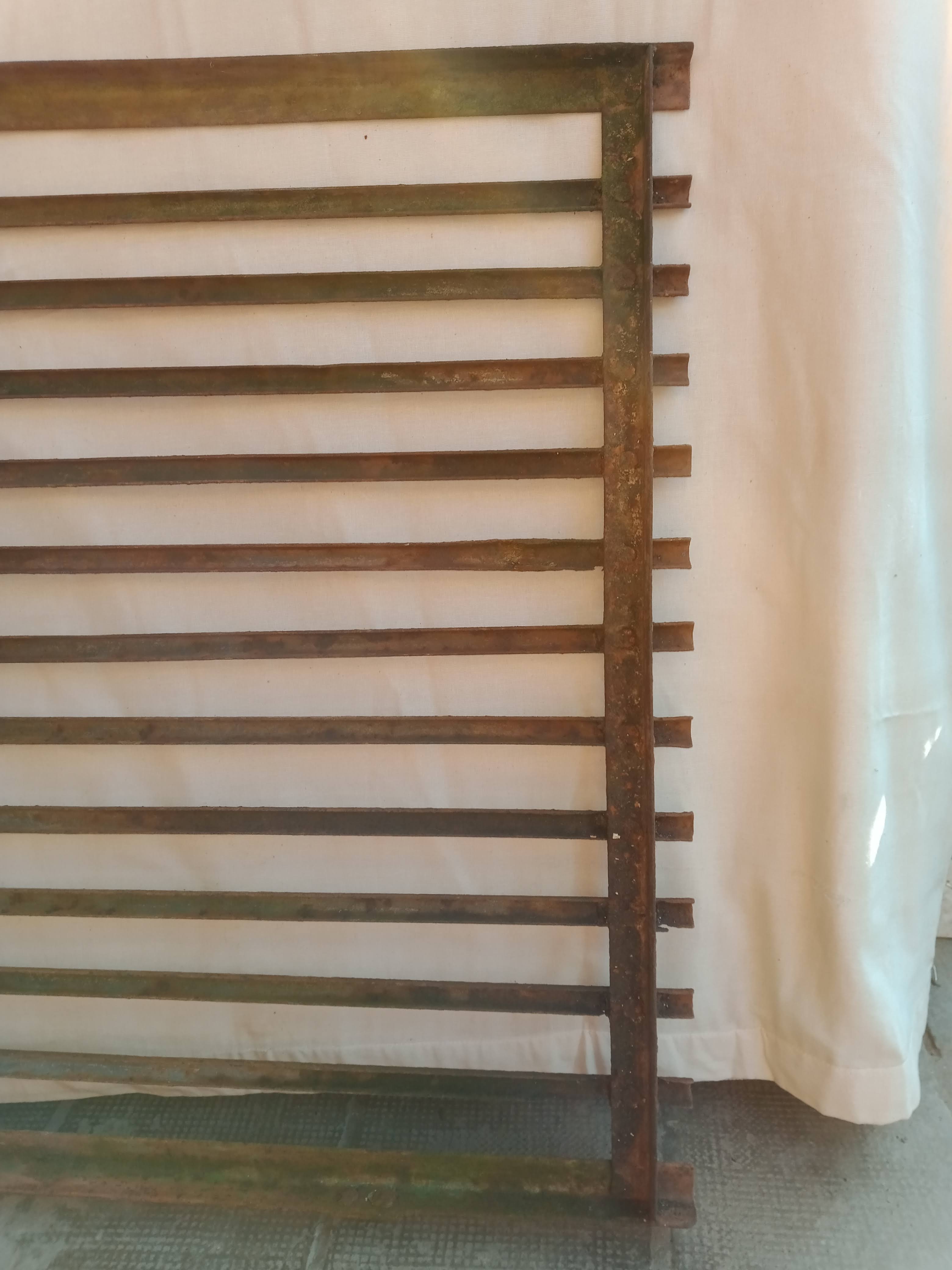 Old riveted metal gate