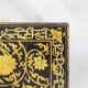Lacquer coffee table decorated with floral motifs. Circa 1900.