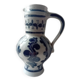 Salt stoneware pitcher with chiseled patterns by M. Schilz