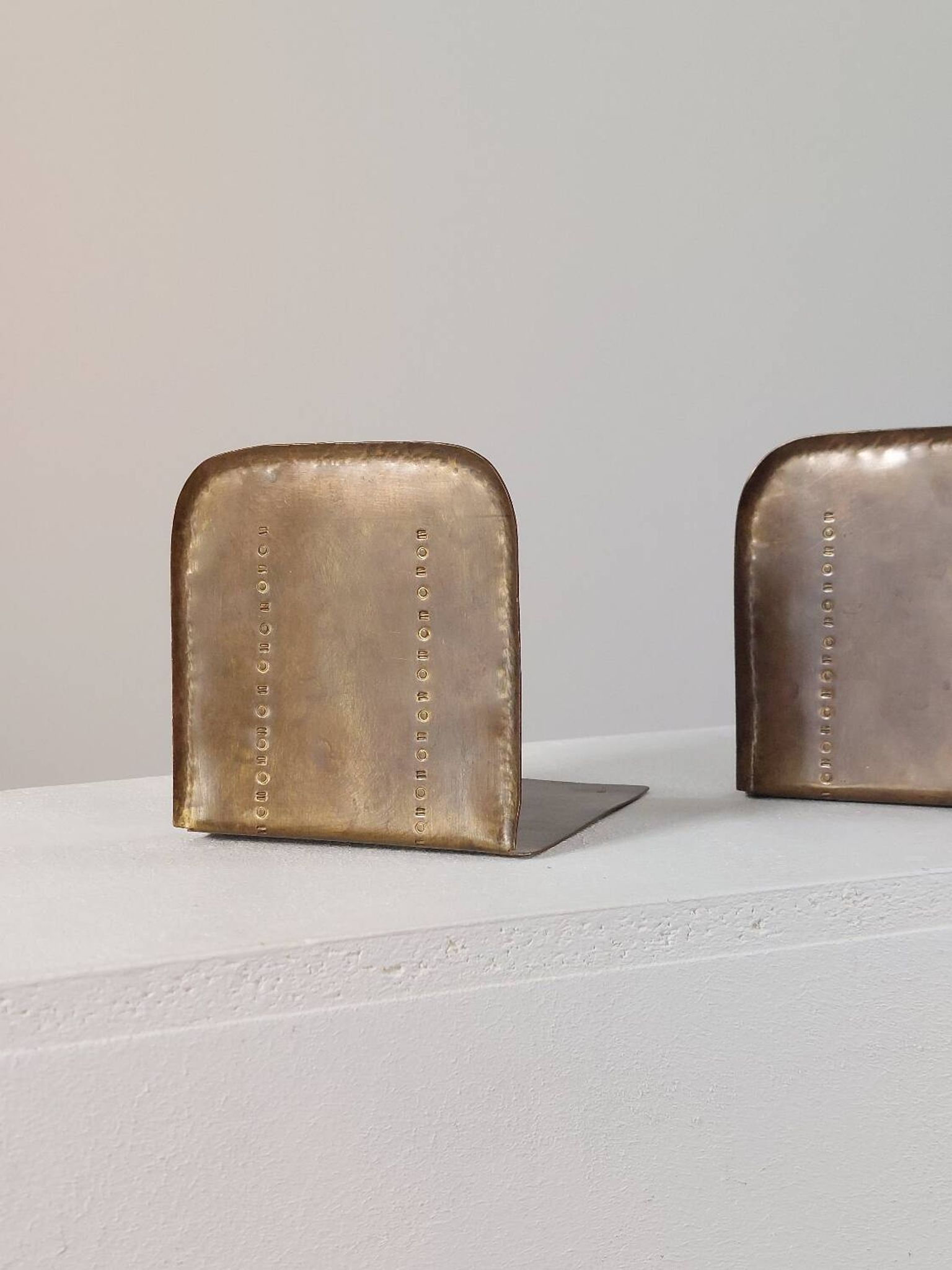 Pair of hand-hammered brass bookends by Hayno Focken