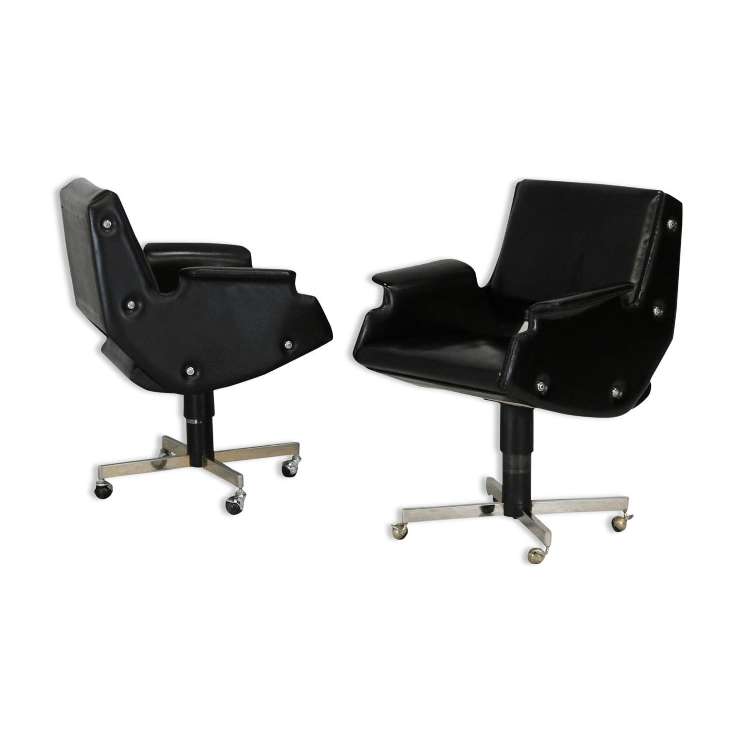 Pair of swivel armchairs, imitation leather and steel, Italy, circa 1960.