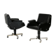 Pair of swivel armchairs, imitation leather and steel, Italy, circa 1960.