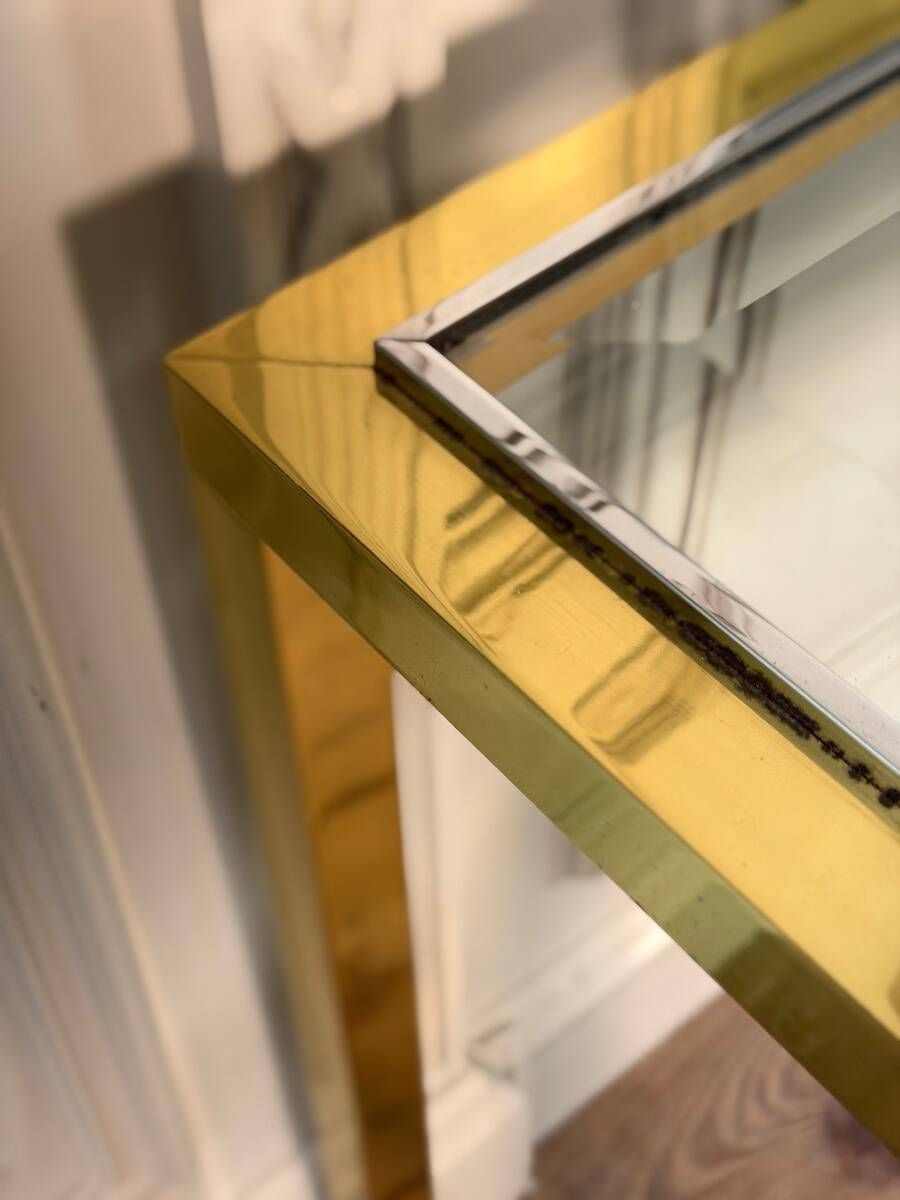 Golden and chrome metal console, bevelled glass, circa 1980.